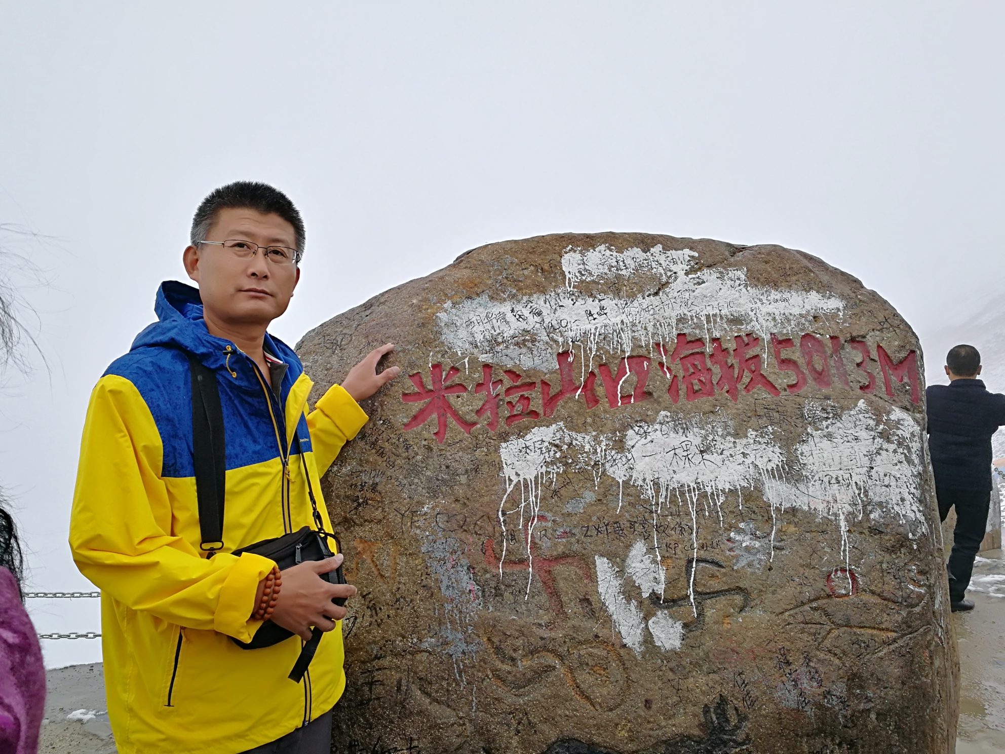 第5天，雨中从拉萨出发翻越冰雪米拉山口，林芝...