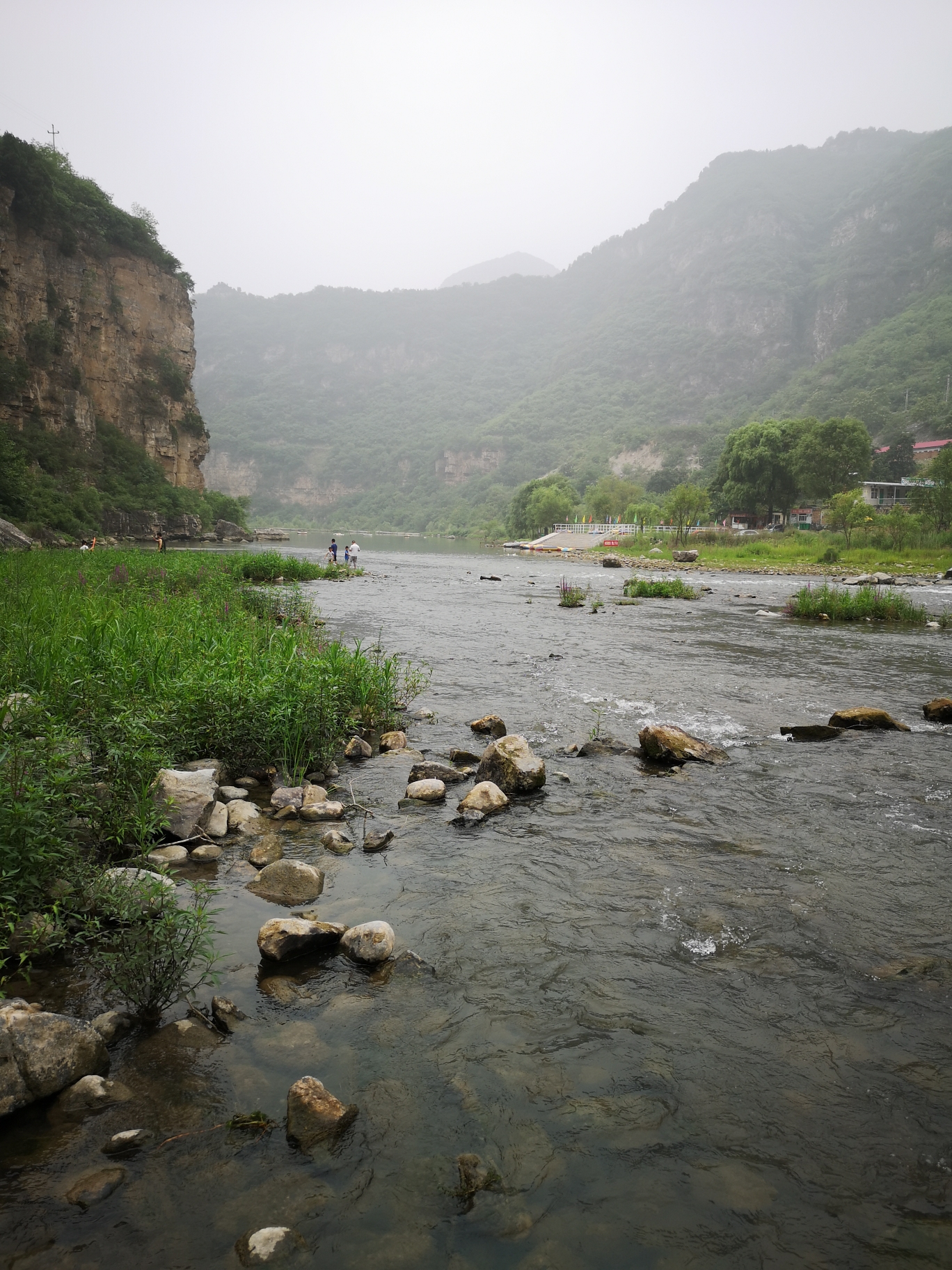 从这里可以到有"天下第一滩"之誉的磨滩风景名胜区当我们从金滩大桥穿